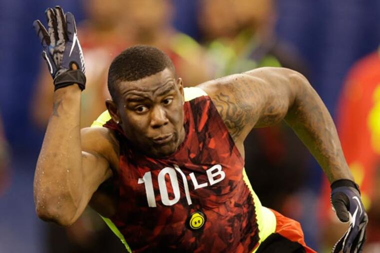 Gerald Hodges runs a drill at the NFL football scouting combine in Indianapolis, Monday, Feb. 25, 2013. (Michael Conroy/AP file)