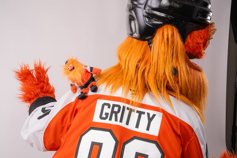 Gritty sports a "shoulder buddy" version of himself.