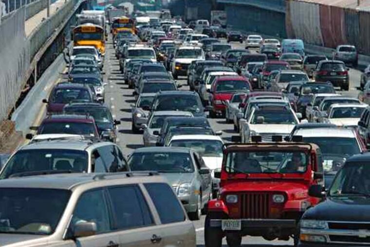 Bumper-to-bumper traffic on the Ben Franklin Bridge. Facing a summer of discontent from unhappy commuters, the Delaware River Port Authority (DRPA) is looking to burnish its image by hiring a public relations agency. (Clem Murray / Staff Photographer)