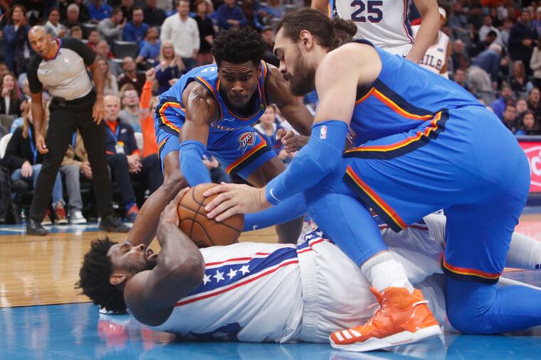 Joel Embiid, left, and the Sixers once again stumbled against the losing squad. Friday night's setback marked their second straight loss and fifth in seven games.