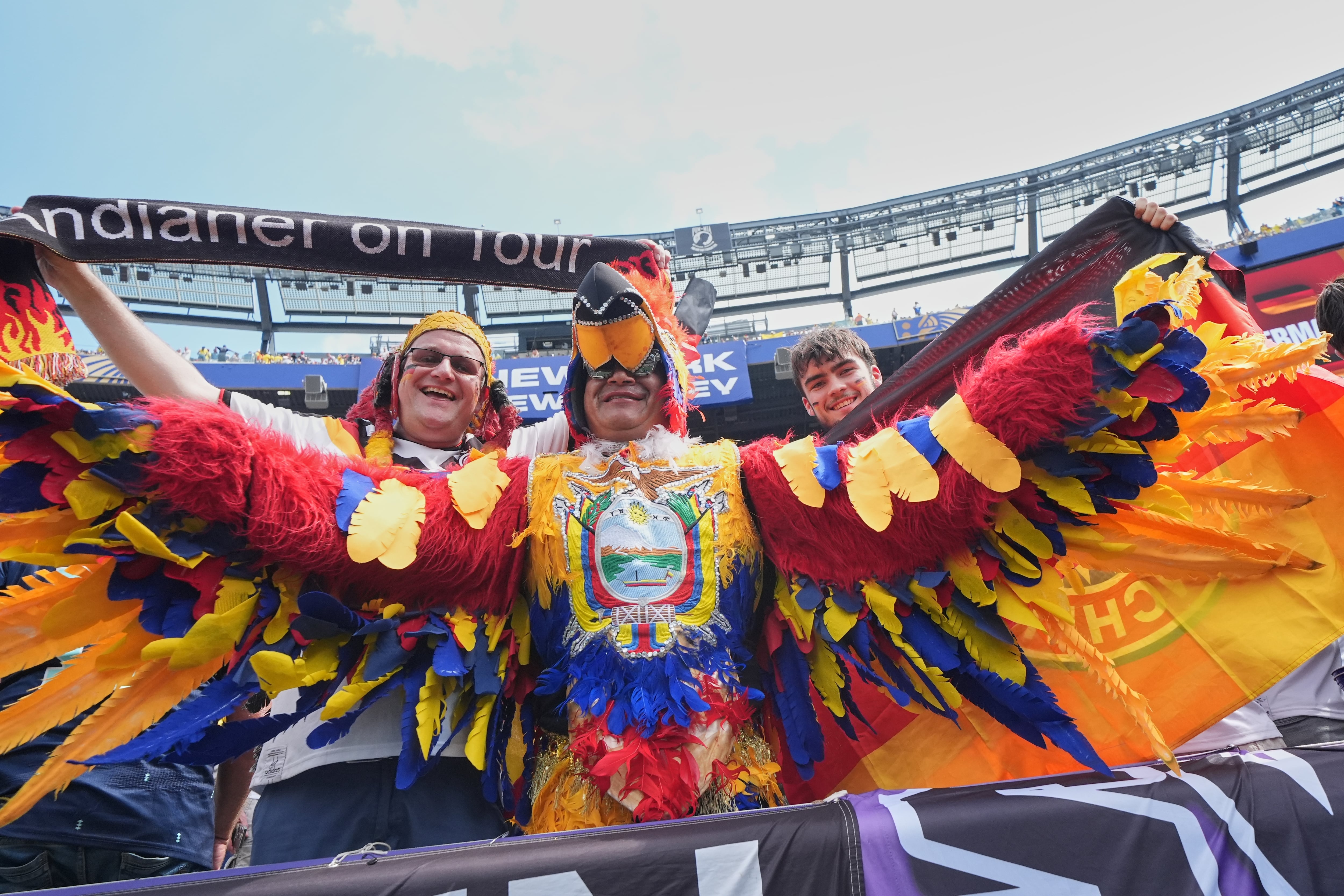 World Cup fans flood stadiums and fan zones with dazzling costumes, facepaint and flags — in photos