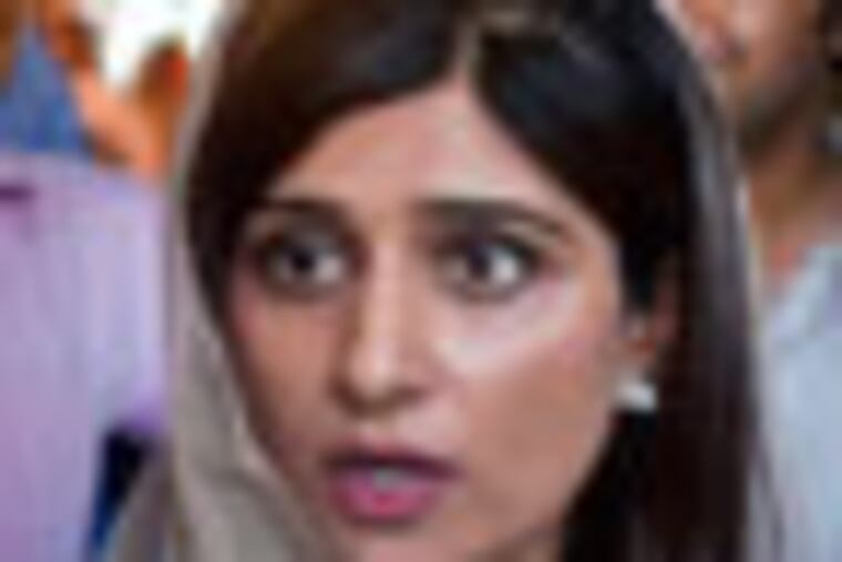Pakistan's Foreign Minister Hina Rabbani Khar, talks to reporter after her press conference in Islamabad, Pakistan on Monday, May 14, 2012. Khar indicated Monday the time has come to reopen the country's Afghan border to NATO troop supplies, saying the government has made its point by closing the route for nearly six months in retaliation for a deadly U.S. attack on its troops. (AP Photo/Anjum Naveed)