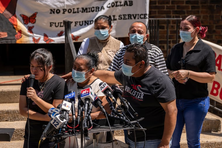 Family members including Ashley, left, daughter of Edwin Lopez-Cornejo, speak during a news conference, Tuesday, Aug. 4, 2026, in Highland Park, N.J. (AP Photo/Yuki Iwamura)