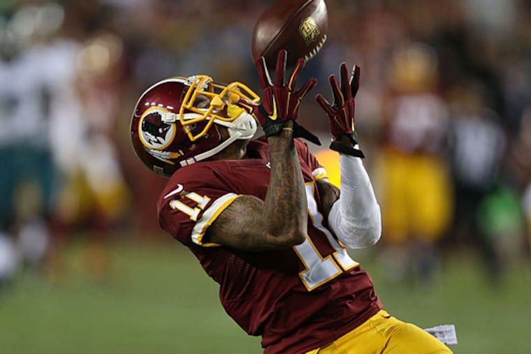 Redskins' DeSean Jackson catches a pass during the 1st quarter. (David Maialetti/Staff Photographer)