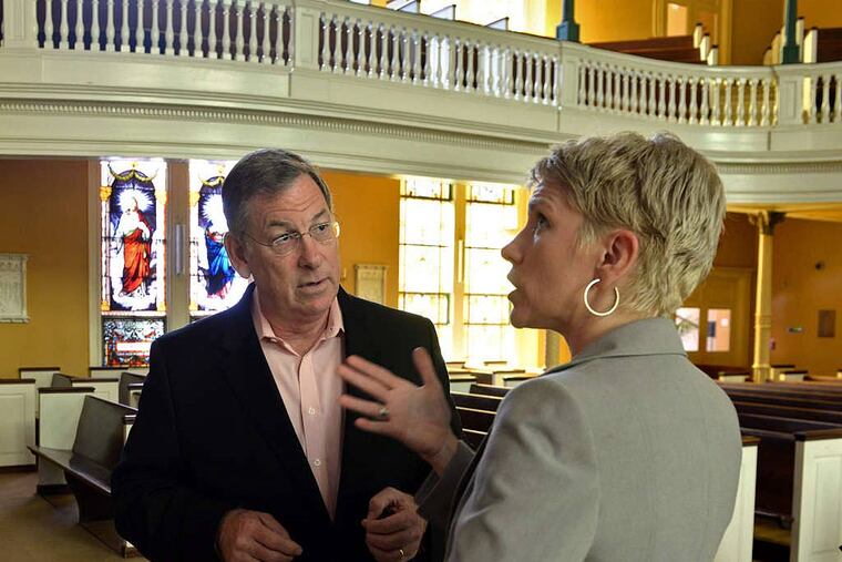 "The character of ethnic Philadelphia and neighborhood Philadelphia is really about Catholic ethnicity and Catholic parishes," says Sam Katz, with producer Katie Oxx in St. Joseph's. TOM GRALISH / Staff Photographer