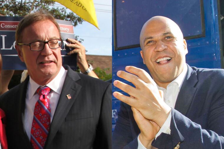 Lonegan (left) and Booker ( Kelsey Anne Dubinsky and David M Warren / Staff Photographers )