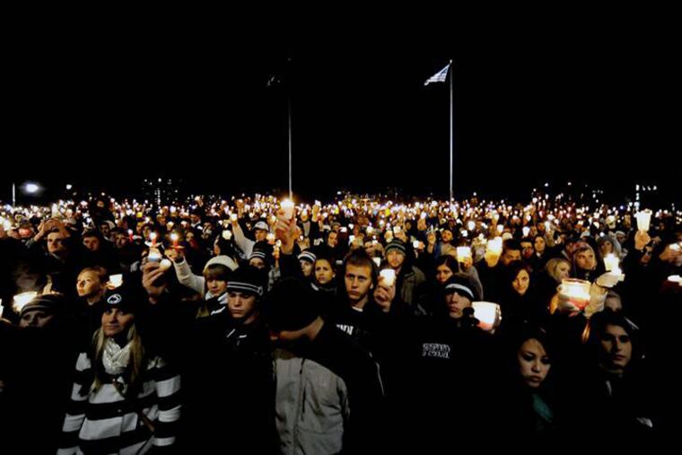 Thousands of students, community members, and Penn State fans filled the Old Main lawn on Nov. 11, 2011 for a vigil held to show support for the victims of the Sandusky sexual abuse scandal.