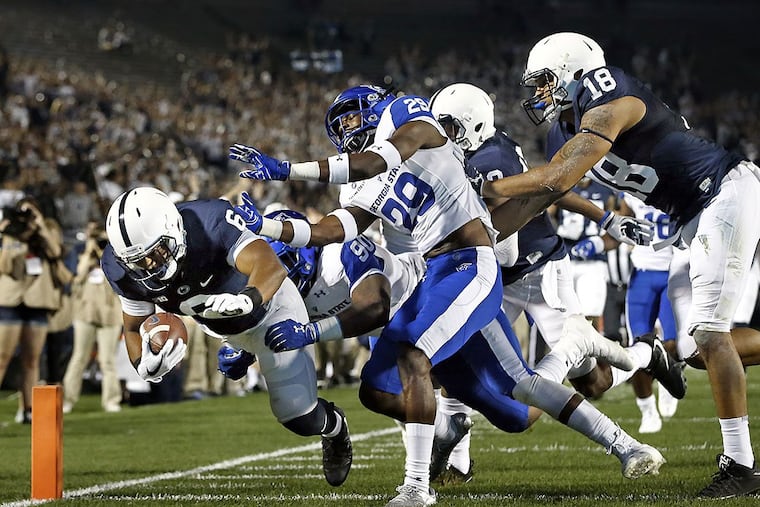 Penn State’s Andre Robinson (6) dives for a touchdown against Georgia State during the second half of an NCAA college football game in State College, Pa., Saturday, Sept. 16, 2017. Penn State won 56-0.