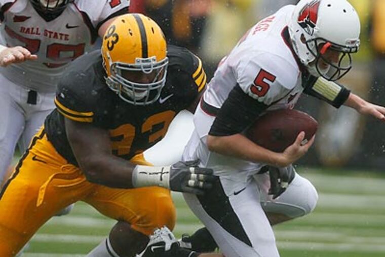 Mike Daniels has been a surprise contributor to an Iowa defense that leads the nation in fewest yards allowed. (Charlie Neibergall/AP)