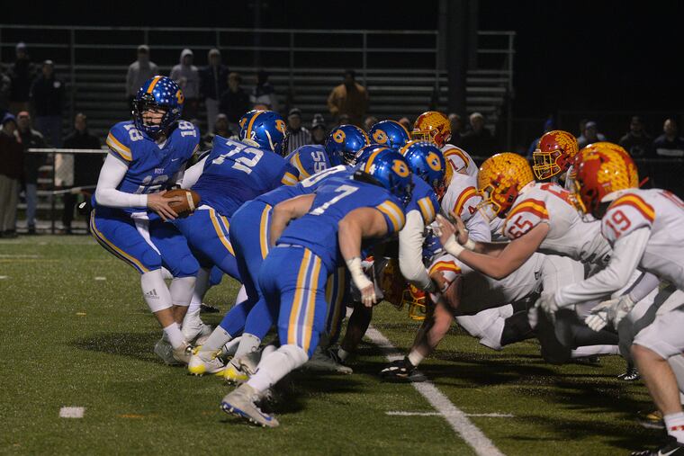 Downingtown West (in blue) will see its football season delayed or postponed if the state shuts down all high school fall sports.