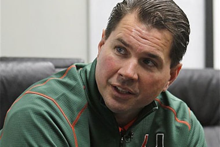 Al Golden says he intends to stay on at Miami and work to rebuild the program. (Alan Diaz/AP)