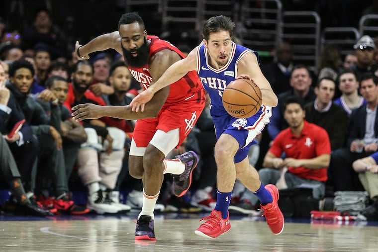 Sixers' T.J. McConnell steals the ball from Rockets' James Harden during the Sixers' win over the Rockets in January at the Wells Fargo Center.