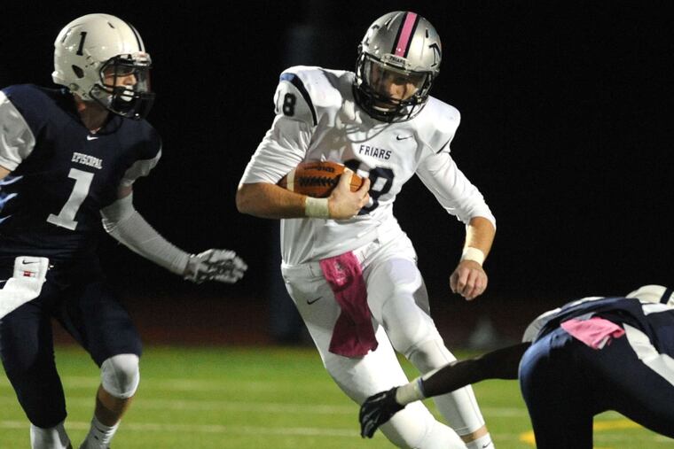 Malvern Prep's Ian Murray tries to thread his way through Episcopal defenders Dan Baker (left) and Dee Will in the first quarter. BRADLEY C. BOWER / For the Inquirer