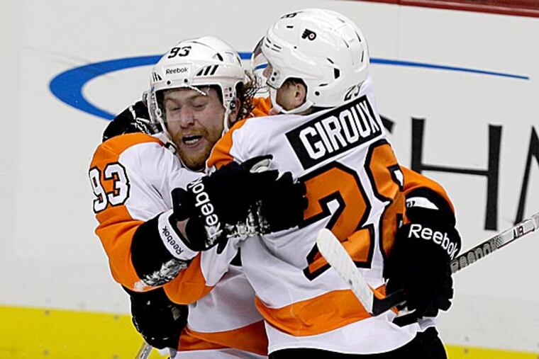 The Flyers trailed by two goals, led by two goals, and needed a hat trick from Jake Voracek to cap off a thrilling, 6-5 victory. (Gene J. Puskar/AP)