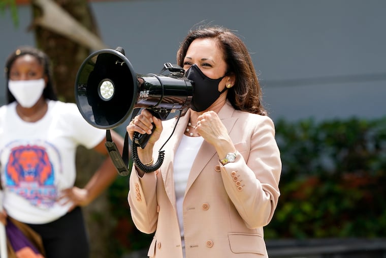 Democratic vice presidential nominee Kamala Harris speaks to the Florida Memorial University marching band on Sept. 10 in Miami Gardens, Fla.