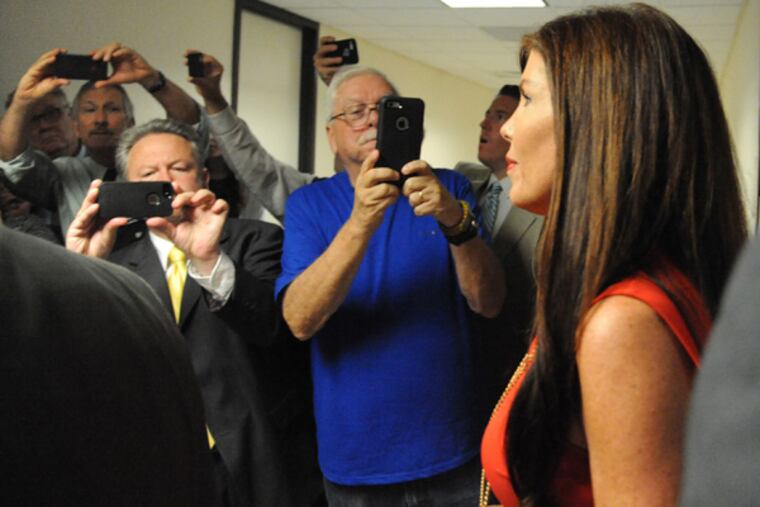 Embattled Pennsylvania Attorney General Kathleen Kane walks into courtroom B at the Montgomery County Courthouse in Norristown for a preliminary hearing on perjury, false swearing and obstruction of justice charges. ( CLEM MURRAY / Staff Photographer )