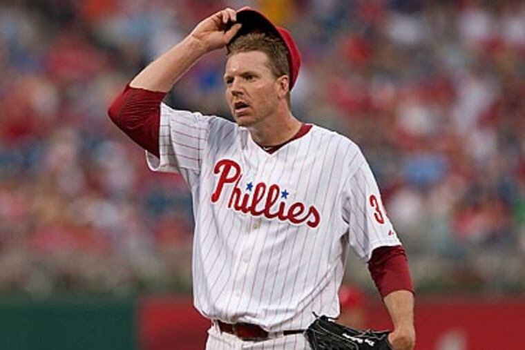 Roy Halladay will make his first start against Toronto, his former team, tonight. (David M. Warren / Staff Photographer)