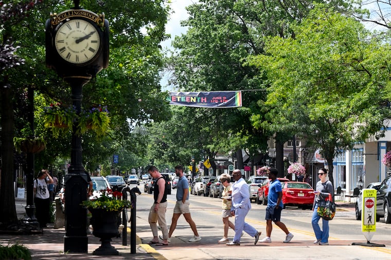 Pedestrians use the crosswalk in downtown Collingswood on Sunday, June 21. This area is lively during weekend days with young families bustling up and down Haddon Avenue but by night, especially during the mid week the main drag is much more quiet.