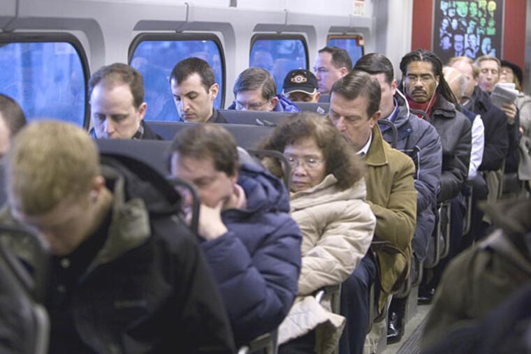 Passengers on the R5 express to Doylestown rested, read or listened to music in SEPTA's "quiet car." Some commuters said others were hoping the SEPTA experiment will expand to other trains as well.