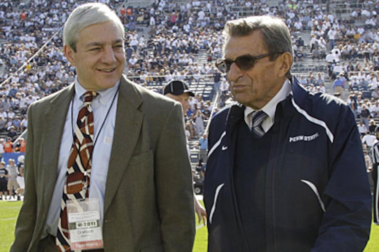 Former university president Graham B. Spanier (left) could soon face charges himself. (Gene J. Puskar/AP file photo)