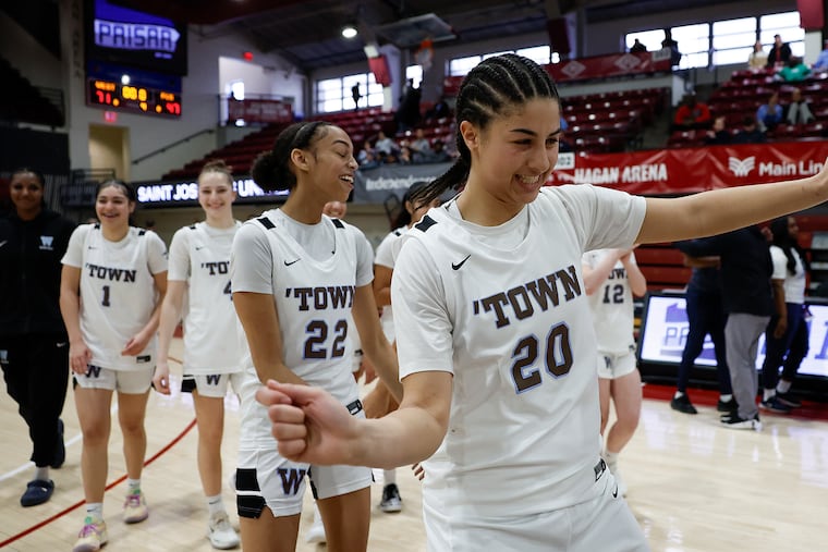 Westtown School’s Jordyn Palmer celebrates after the rout of Friends' Central for the PAISAA girls’ basketball championship at Hagan Arena.