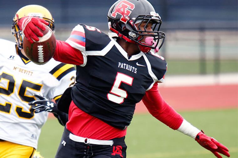 Germantown Academy freshman Jon Haynes completes an 85-yard touchdown return of the opening kickoff against Bishop McDevitt. Trailing him is the Lancers' Chris Feralio. Host GA went on to win, 41-6, Saturday (10/3/15) in a nonleague football game.