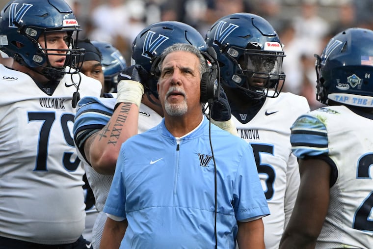 Villanova coach Mark Ferrante watches a replay on the scoreboard during the third quarter against Penn State last Saturday. Penn State won, 52-6.