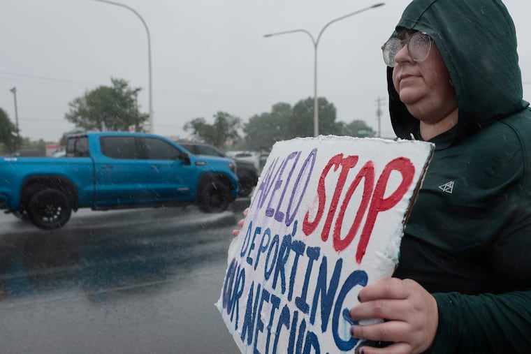 Hadrian Cissell of Wilmington made her point in front of the Wilmington Airport (ILG) in New Castle County in Delaware on May 22, 2025. Cissell and others were urging Avelo Airlines to end its contract to carry ICE deportees. Avelo is Delaware’s only commercial airline.