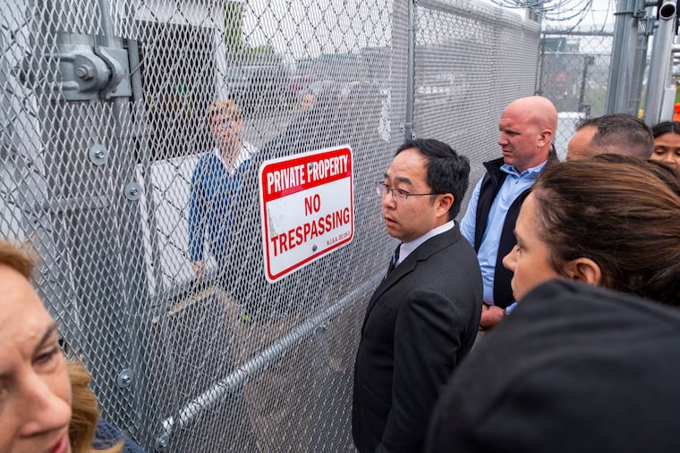 Sen. Andy Kim waits while seeking access to Delaney Hall in Newark, N.J. on Monday.