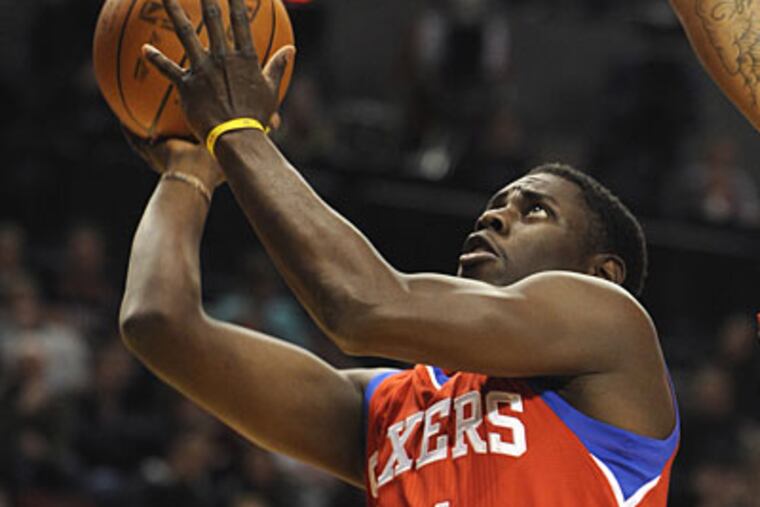 Jrue Holiday scored 13 points but also accounted for six of the Sixers' 20 turnovers. (Greg Wahl-Stephens/AP Photo)