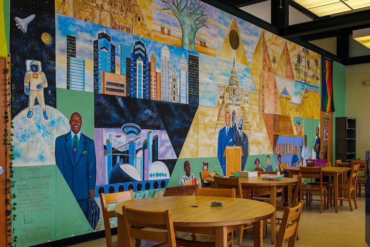 The mural "Let Beauty Fill Their Eyes." was painted by artist David Lawrence and portrait artist Rhasaan Fort in 2000. It is pictured in the Cecil B. Moore Library, 2320 Cecil B. Moore Ave., Philadelphia, Wednesday, March 26, 2025.