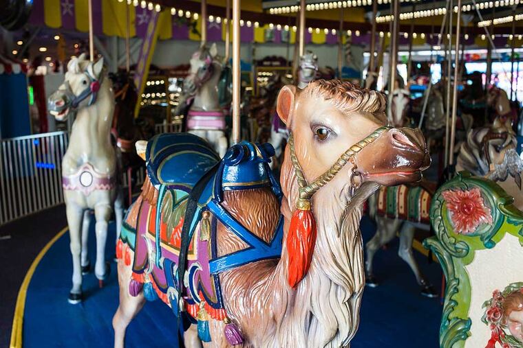 The Casino Pier Carousel in Seaside Heights, New Jersey, was hand-carved in Philadelphia around 1910. After surviving Hurricane Sandy and a fire, the carousel is being auctioned off by the owners, who want to free up space and rid themselves of maintenance costs. July 15, 2014, Seaside Heights, New Jersey. ( MATTHEW HALL / Staff Photographer )