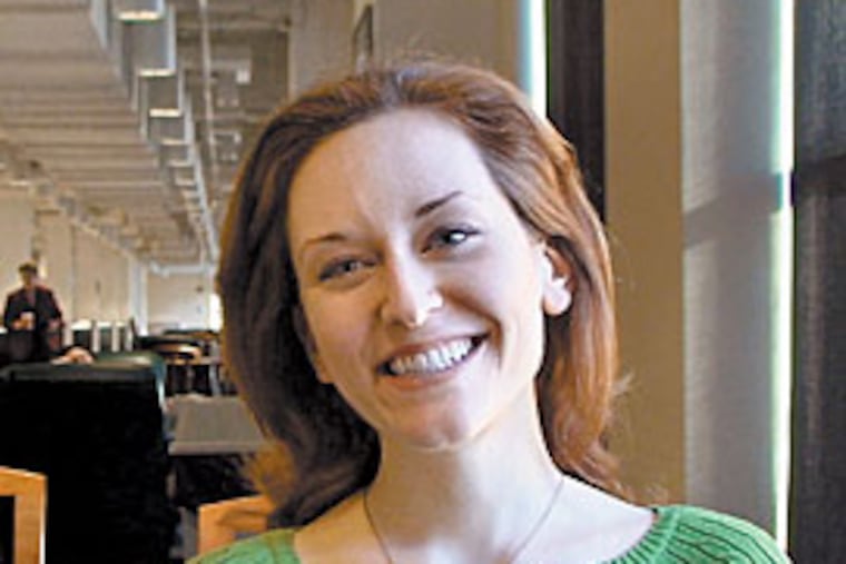 Intuition has led 25-year-old Amy Walker to Chestnut Hill and Web stardom. Her video took off after being posted on Break.com in late February.
(ROBERT MORAN / Inquirer Staff)