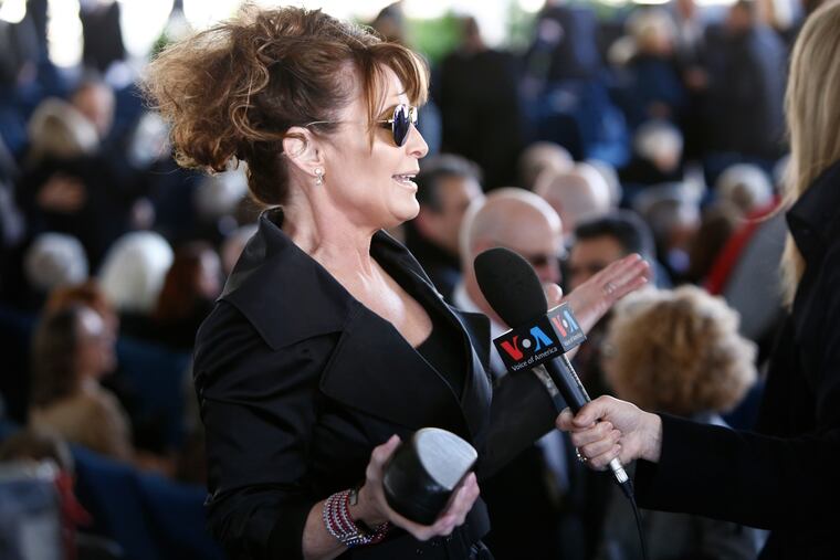Former Alaska Governor Sarah Palin gives a media interview before the start of a funeral service for Rev. Billy Graham at the Billy Graham Library on March 2, 2018 in Charlotte, North Carolina. (Brian Blanco/Getty Images/TNS)