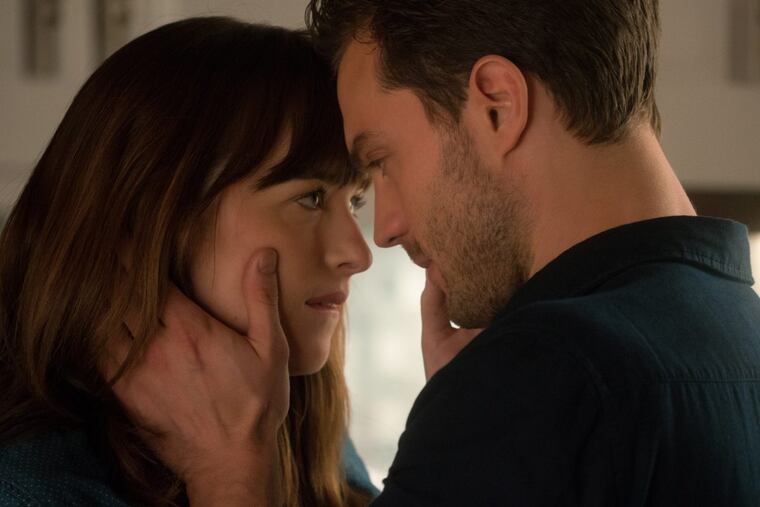 Dakota Johnson and Jamie Dornan in ‘Fifty Shades Freed.’