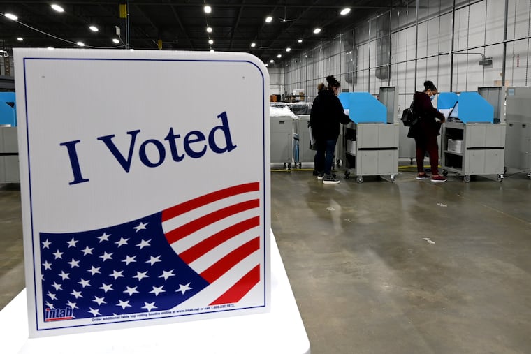 Voters cast their ballots at the Camden County Elections and Archive Center in Blackwood on Oct.27, 2021.