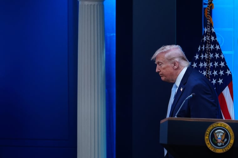 President Donald Trump departs after speaking with reporters during a news conference in the James Brady Press Briefing Room at the White House, Monday.