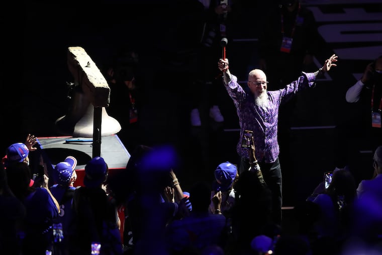 Pate Croce, the former President of the 76ers, rings the Liberty Bell replica before the game between the SIxers and the Wizards at the Wells Fargo Center on May 26, 2021.