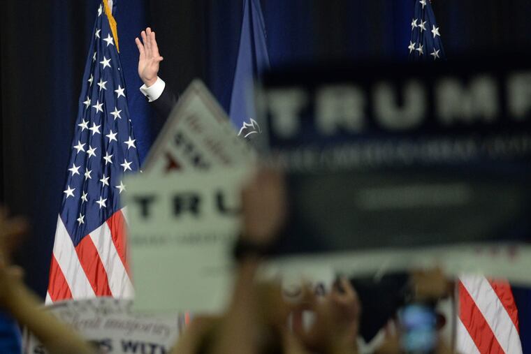 Republican presidential candidate Donald Trump waves as he leaves the stage following a campaign Rally at West Chester University April 25, 2016.