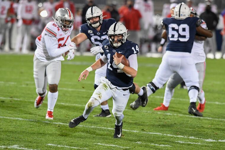 Penn State quarterback Sean Clifford carries against Ohio State during the second quarter,