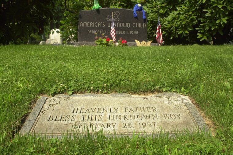 The grave of an unknown boy whose body was found in northeast Philadelphia in 1957 is shown at Ivy Hill Cemetery Wednesday, June 26, 2002.