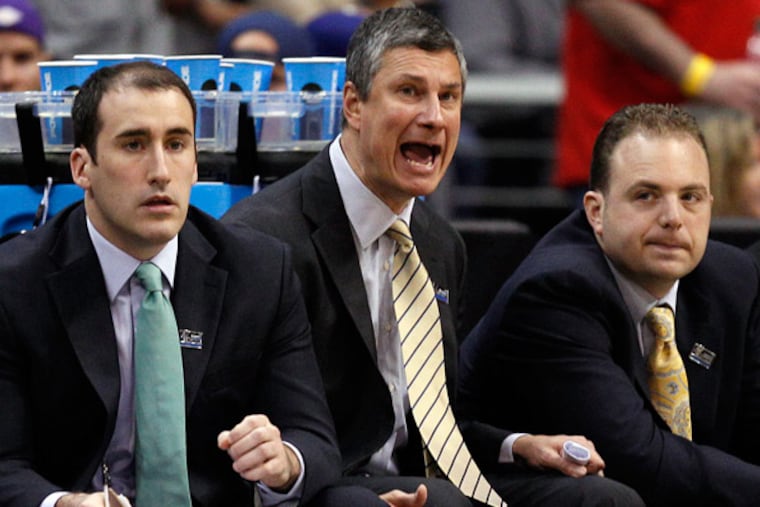La Salle Head Coach John Giannini (center) yells during La Salle's loss to Wichita St. (Yong Kim/Staff Photographer)