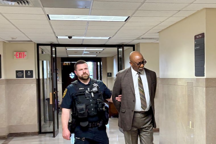 Macarthur Williams is escorted out of a courtroom in the Montgomery County Courthouse on Wednesday after being sentenced to five to 23 months in county jail.