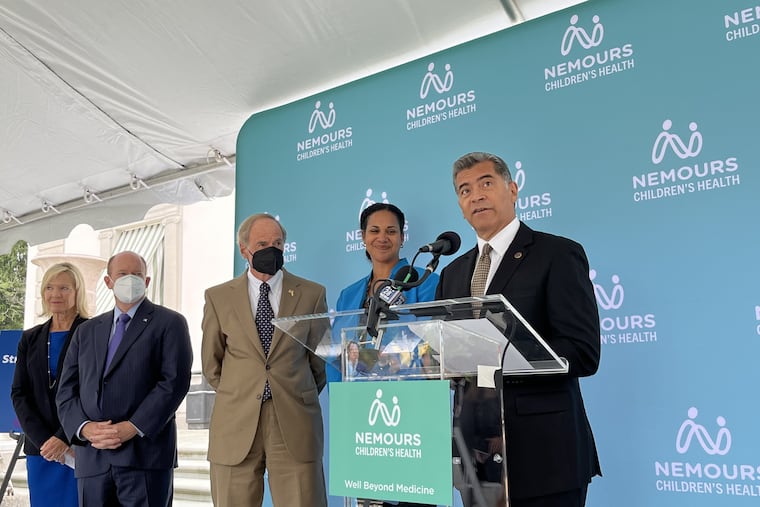 U.S. Health and Human Services Xavier Becerra Speaking at a press conference at the Nemours Estate in Wilmington, Delaware following a roundtable discussion about youth mental health. To his left are Dr. Kara Odom Walker, Executive Vice President and Chief Population Health Officer for Nemours Children's Health, U.S. Senator Tom Carper, U.S. Senator Chris Coons, and Delaware Lt. Gov Bethany Hall-Long.