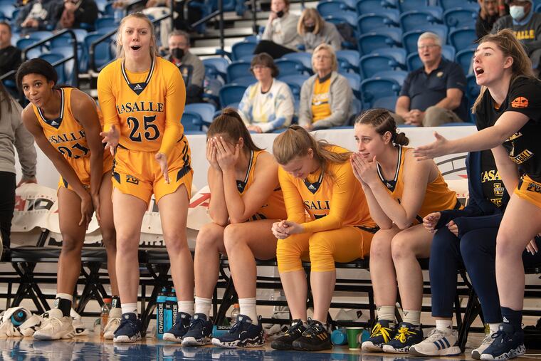 La Salle University's bench reacts in the final minutes of the game against George Washington University, during the Atlantic 10 women's basketball tournament at Chase Fieldhouse in Wilmington, DE. Thursday, March 3, 2022.