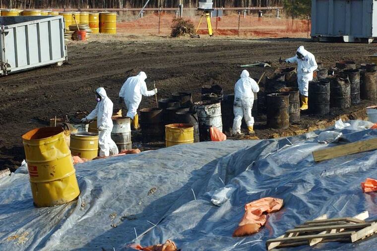 Drums of waste at the Ciba-Geigy chemical plant in Toms River in 2004, when a $91 million cleanup began. (SARAH J. GLOVER)
