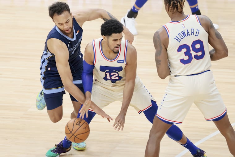 Kyle Anderson steals the ball from Tobias Harris in the first quarter of Sunday's loss.
