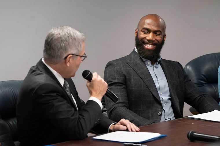 Philadelphia District Attorney Larry Krasner, left, and Players Coalition Co-Founder and Philadelphia Eagles Safety Malcolm Jenkins, right, host a press conference to address the injustices with the money bail system in Philadelphia, November 26, 2018.