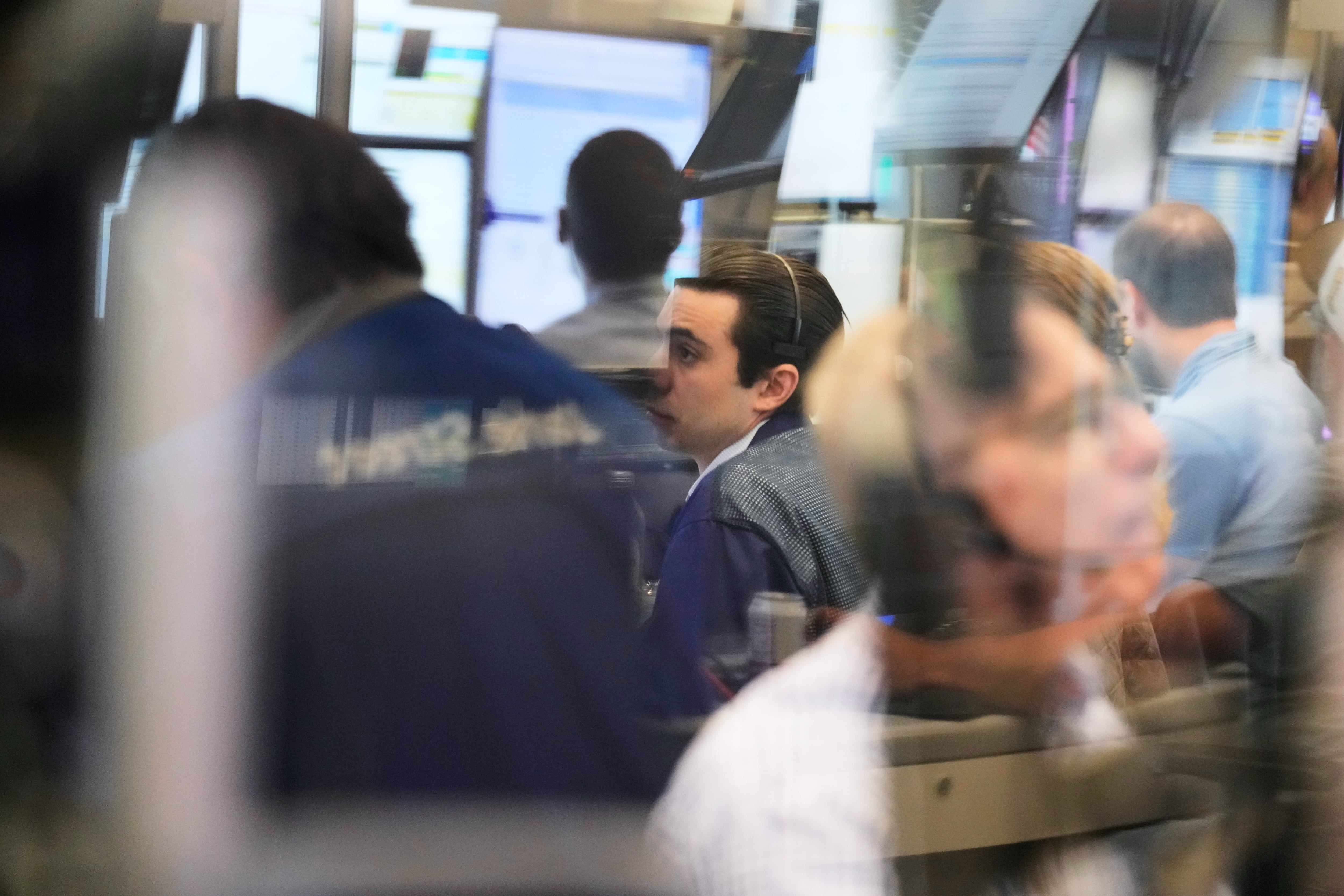Asian shares mostly rise amid market optimism about AI, despite Iran worries