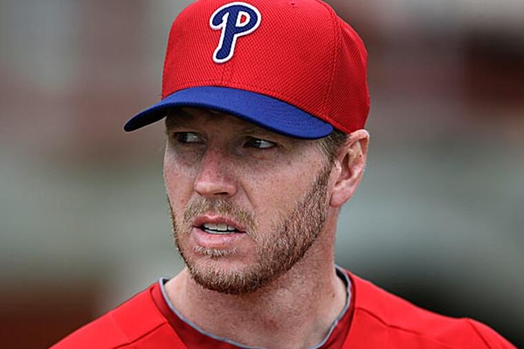 Roy Halladay is as optimistic as ever that he will pitch in 2013. (Matt Slocum/AP)
